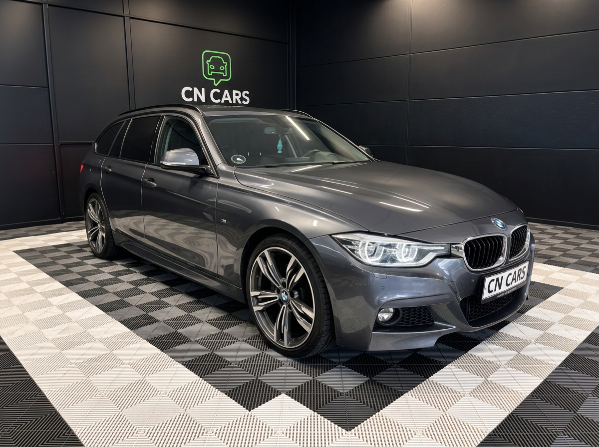 Solgt grå BMW 3-serie i CN CARS showroom